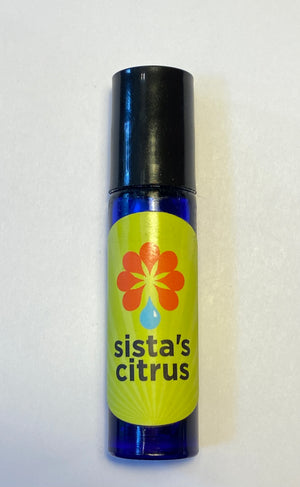 Cobalt blue rollerball filled with Sista's Citrus aromatherapy blend.