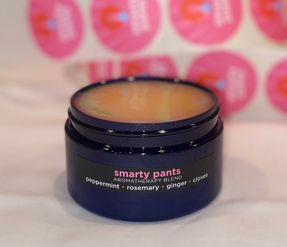 
            
                Load image into Gallery viewer, Four ounce cobalt jar of Smarty Pants Himalayan Salt Scrub. Made with essential oils peppermint, rosemary, ginger, and clove
            
        