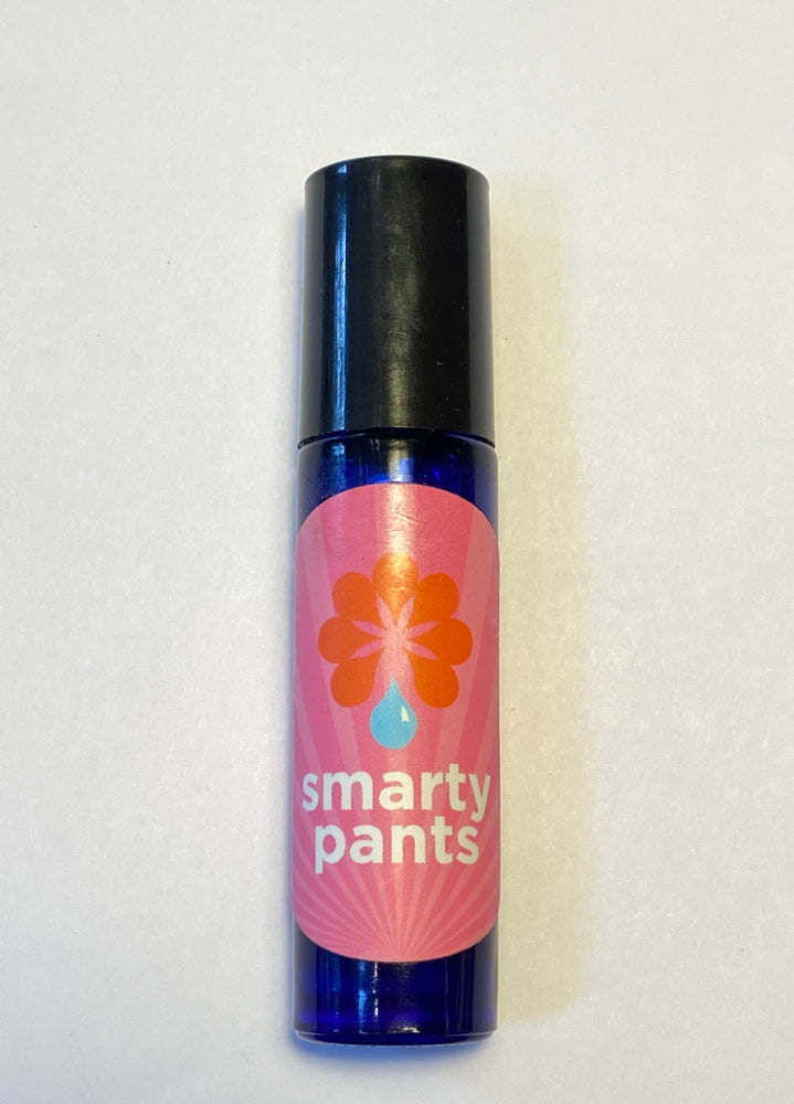 Cobalt blue rollerball filled with Smarty Pants aromatherapy blend.
