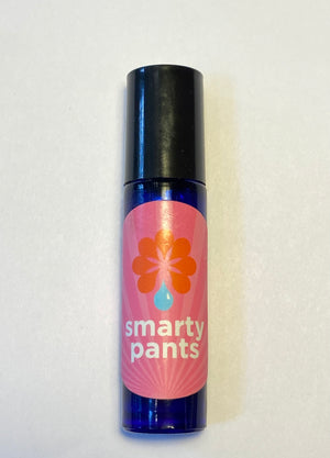 Cobalt blue rollerball filled with Smarty Pants aromatherapy blend.