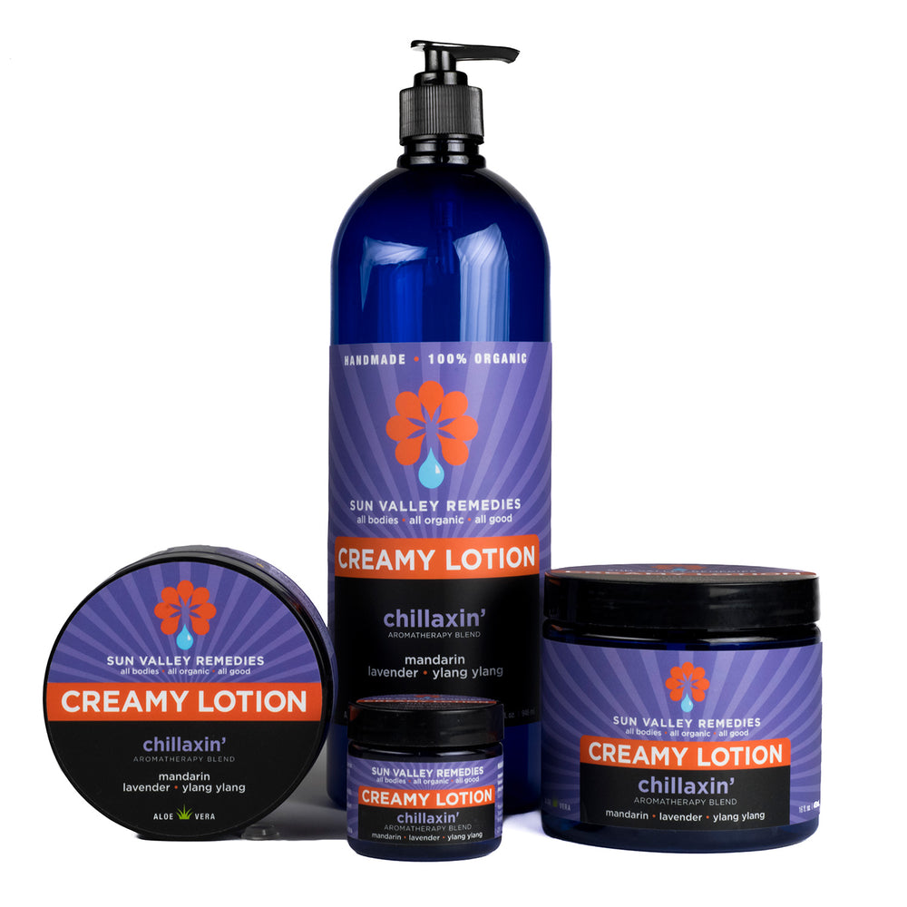 
            
                Load image into Gallery viewer, Four cobalt containers of Chillaxin&amp;#39; Lotion. The purple label indicates the aromatherapy is mandarin, lavender, and ylang ylang
            
        