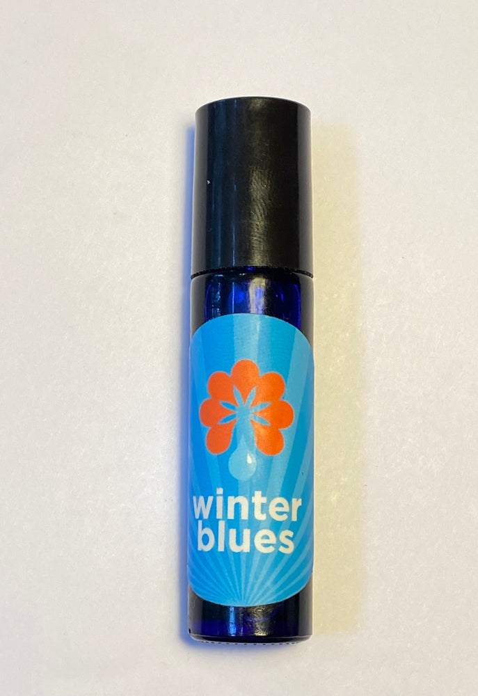 
            
                Load image into Gallery viewer, Cobalt blue rollerball filled with Winter Blues aromatherapy blend.
            
        