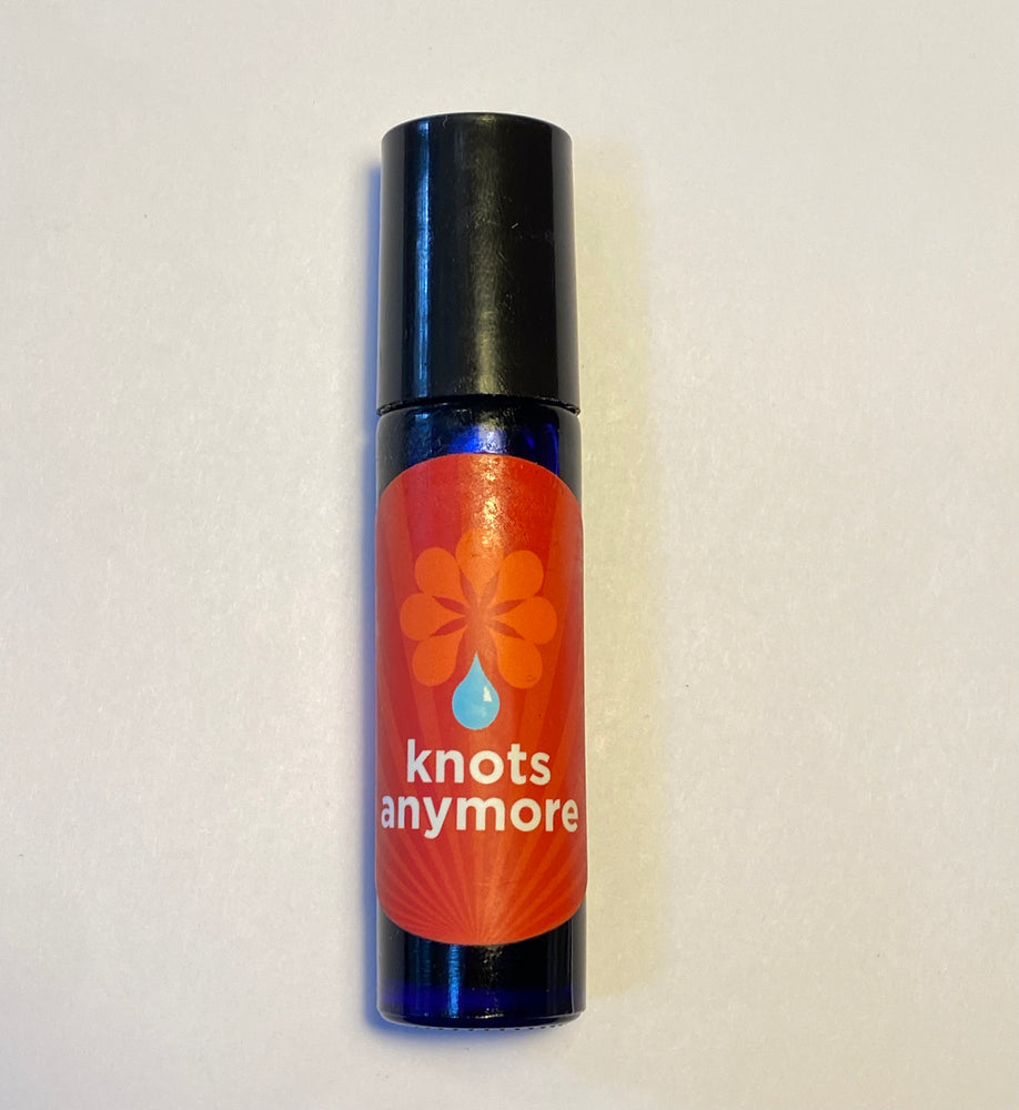 Cobalt blue rollerball filled with Knots Anymore aromatherapy blend.